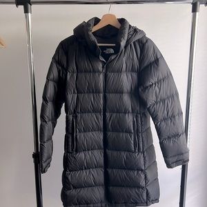 Woman’s North Face Down Parka. Size is Medium.